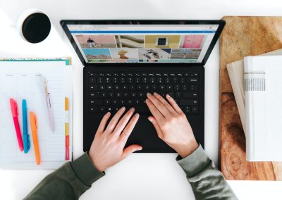 person using Microsoft Surface Laptop black laptop